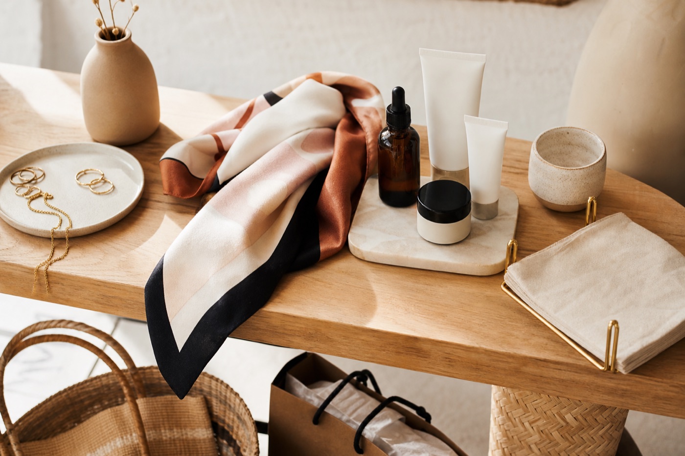 Curated merchant counter with products across beauty, fashion, and retail